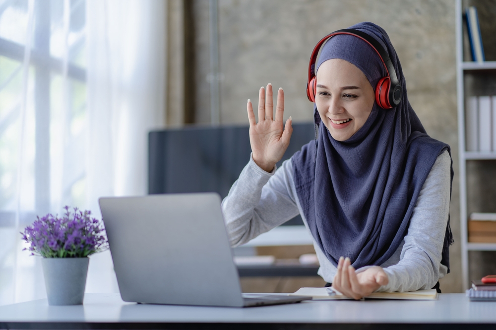 Muslim,Female,Student,In,Hijab,Studying,Online,With,Laptop,Asian